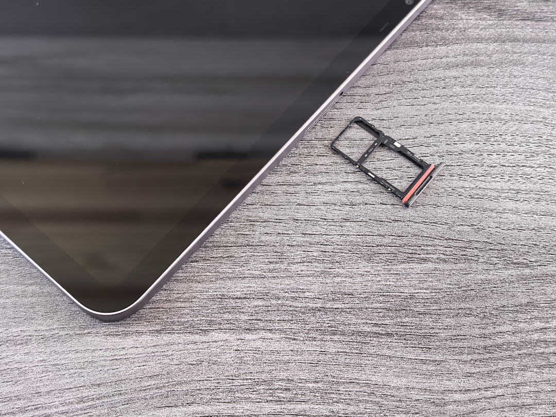 SIM card slot tray